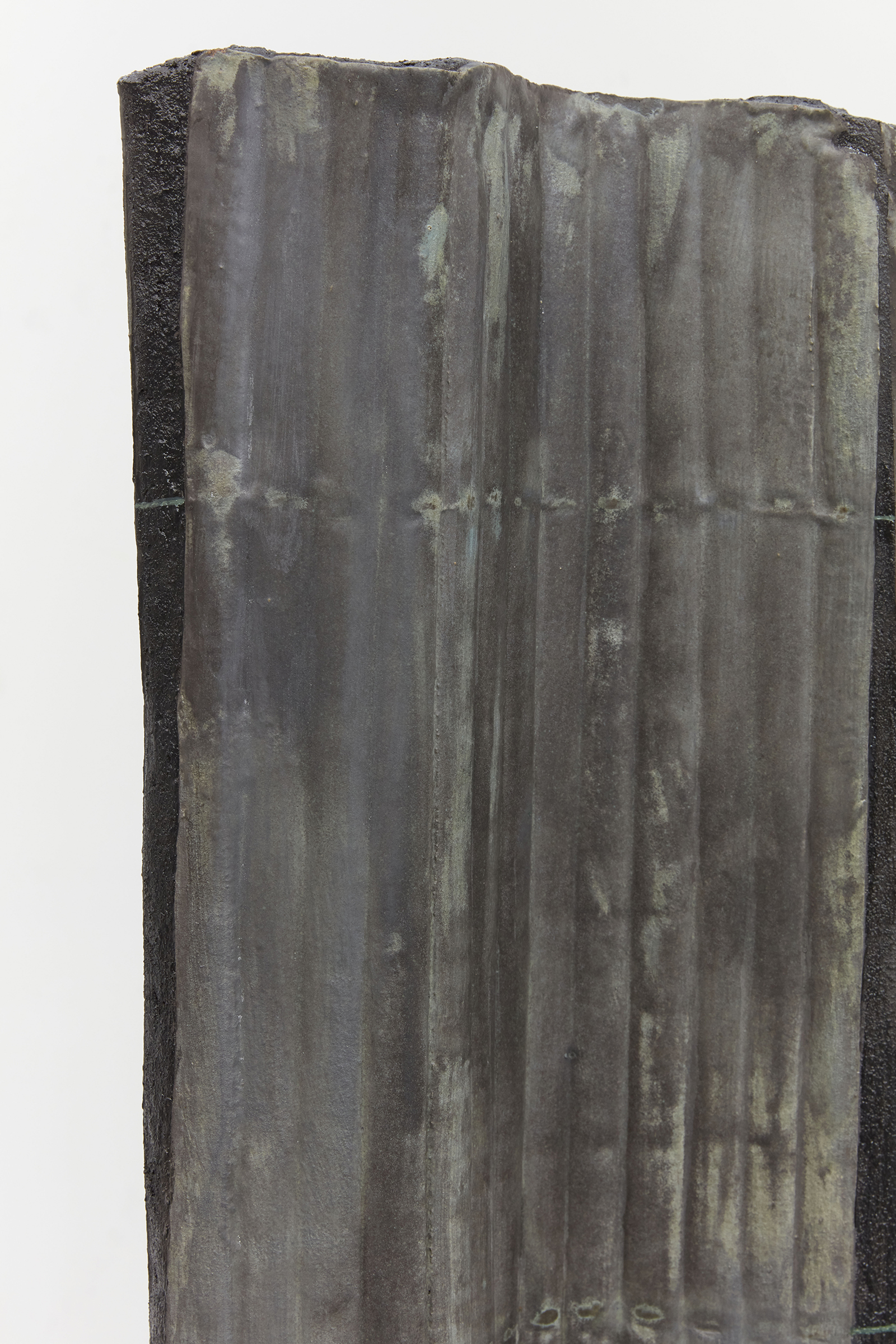 Anne Libby, Total Partial Annular (detail), 2020, glazed ceramic, steel, sanded grout, 66h x 12w x 12d in.