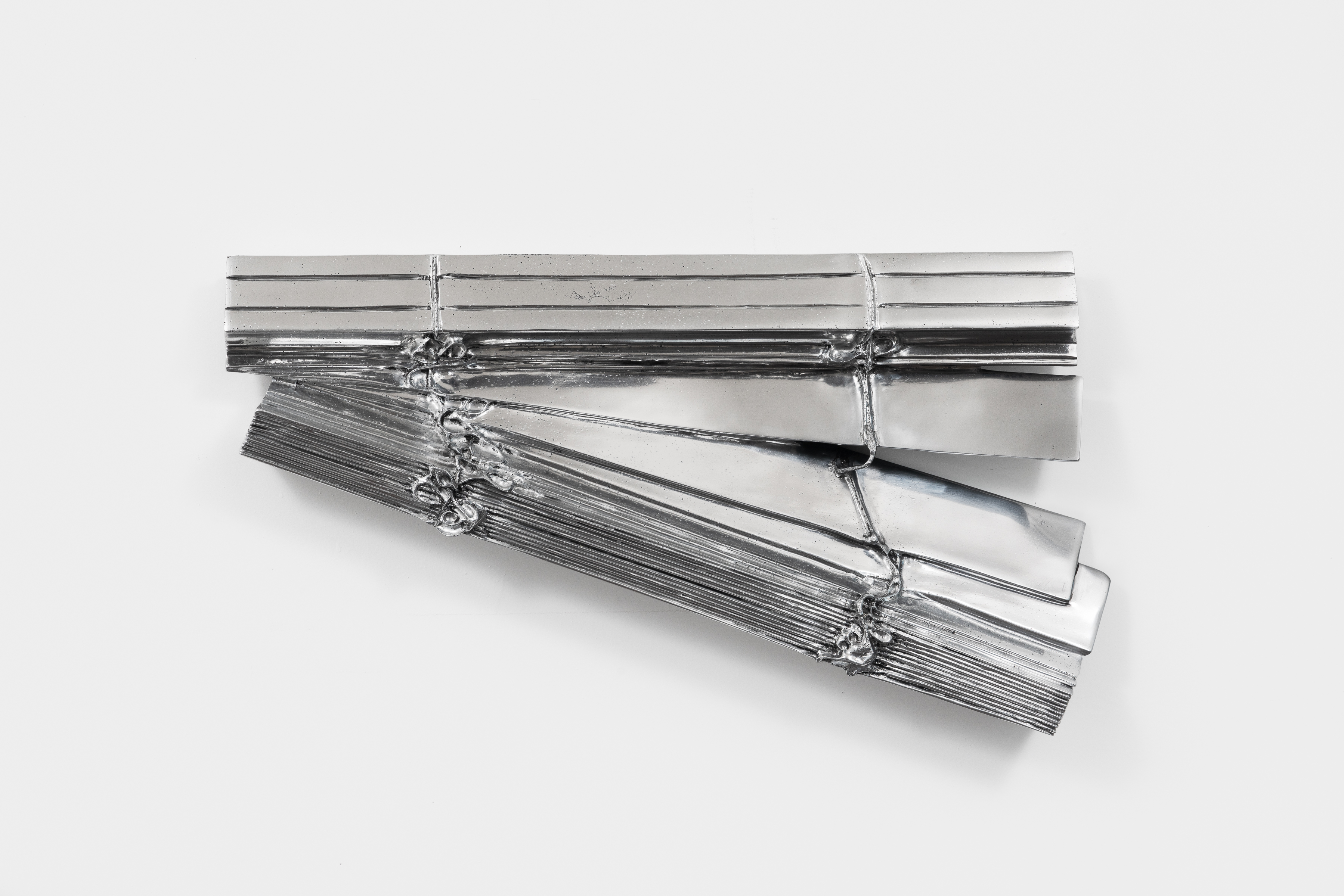 Anne Libby, These Days, 89.9, 2022, Polished cast aluminum, 13 x 22 x 3 in.