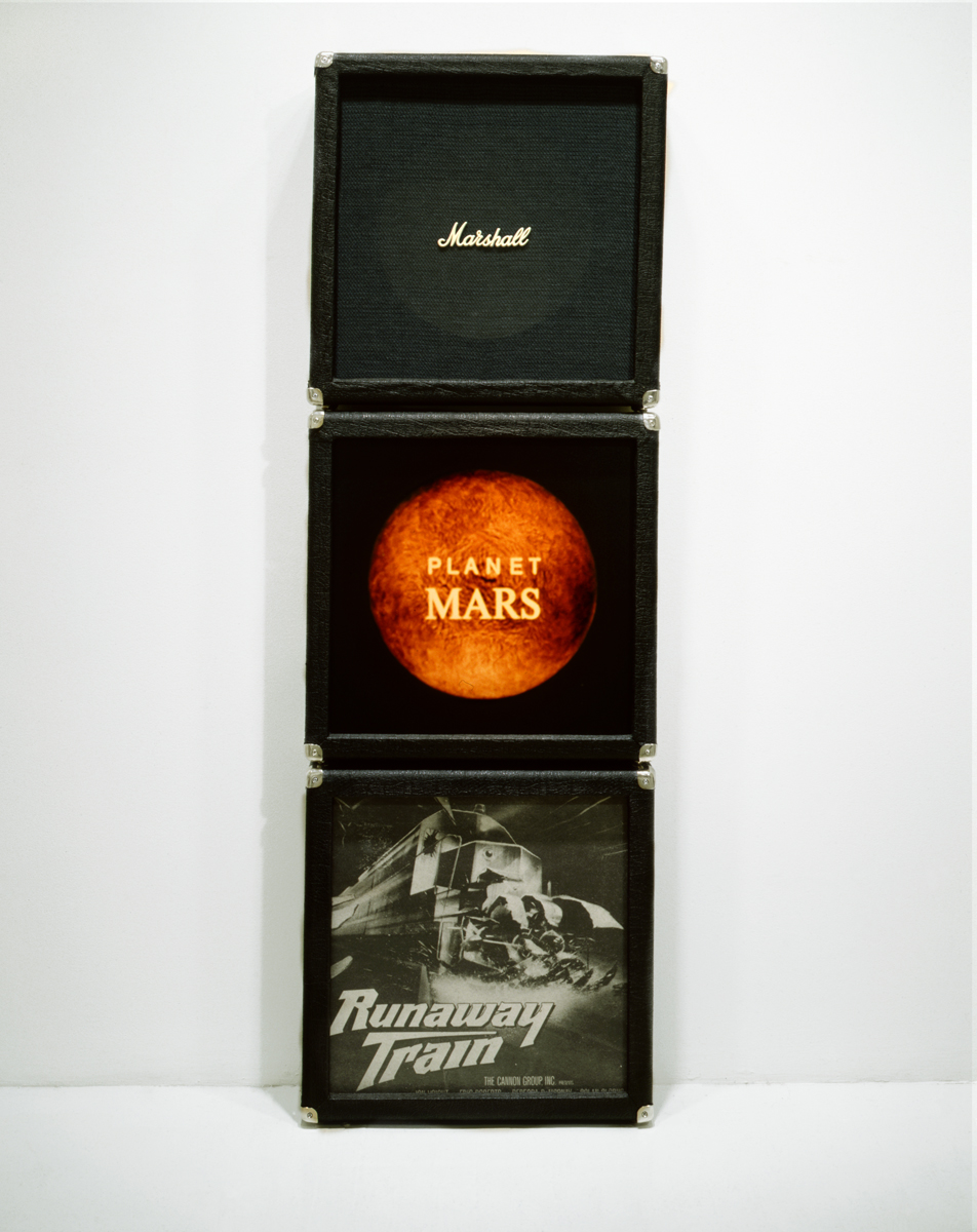Jennifer Bolande,  Marshall Stack, 1987, 3 handmade vinyl and wood speaker cabinets, color photos, Marshall speaker cloth, plastic Marshall logo, 69h x 22.5w x 6.5d in.