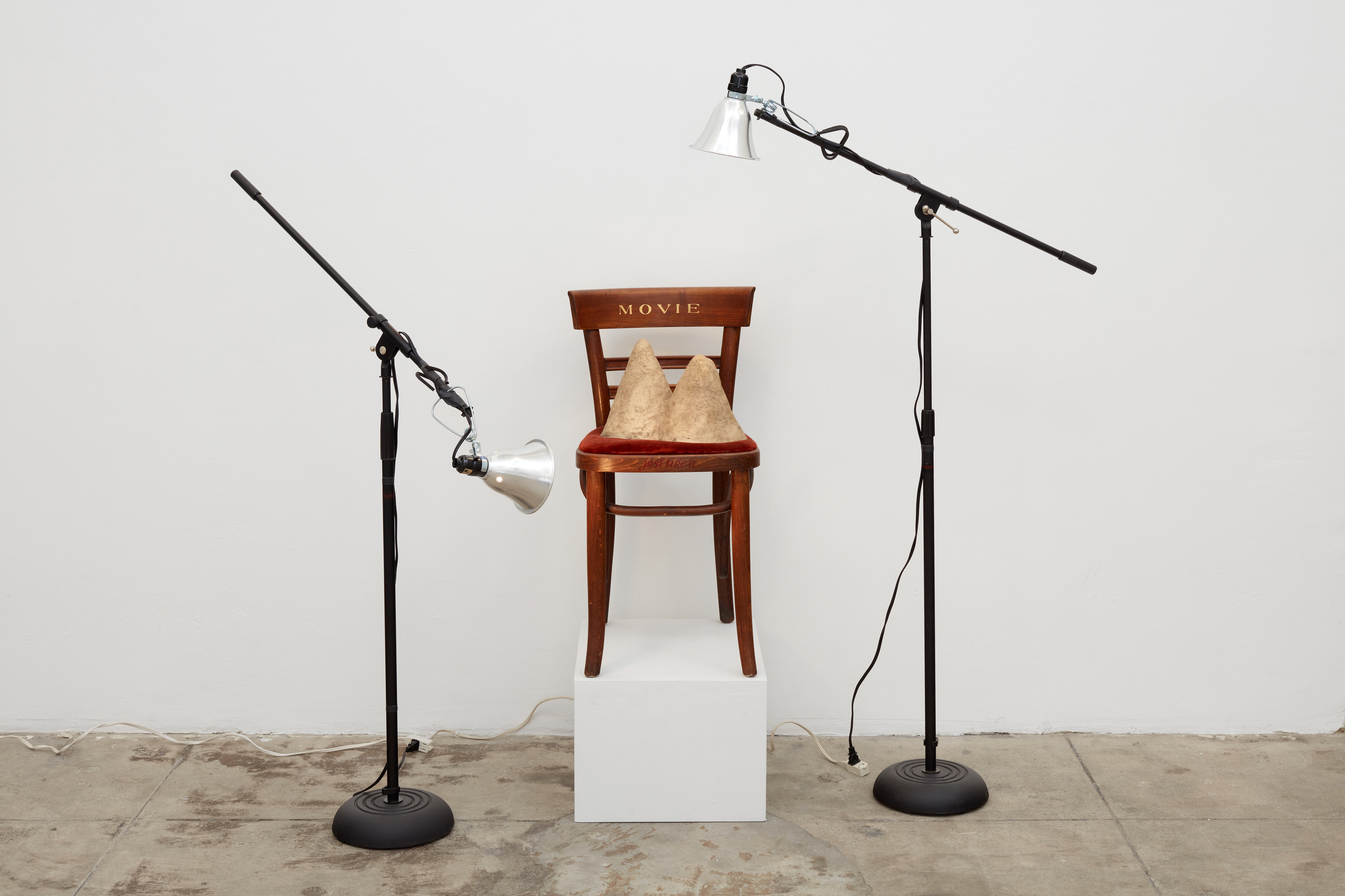 Jennifer Bolande, Movie Chair, 1984, wooden chair, velvet, bronze, enamel paint, light stands, lights, gaffer’s tape, 60 x 72 x 36 in.