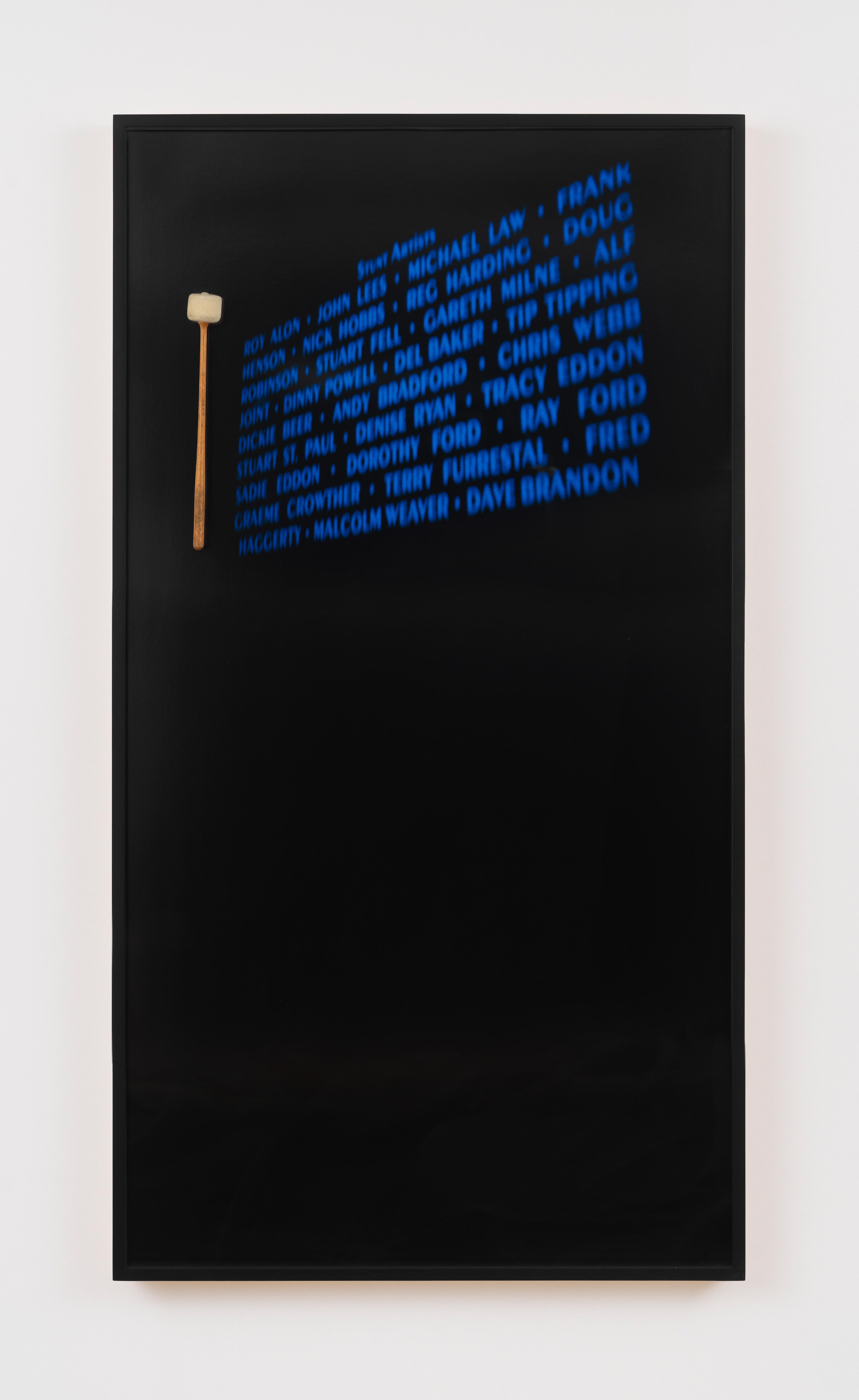 Jennifer Bolande, Stunt Artists IV, 1985-2010, Inkjet print, drum mallet attached to framing glass, 70 x 37 1/2 x 2 in.