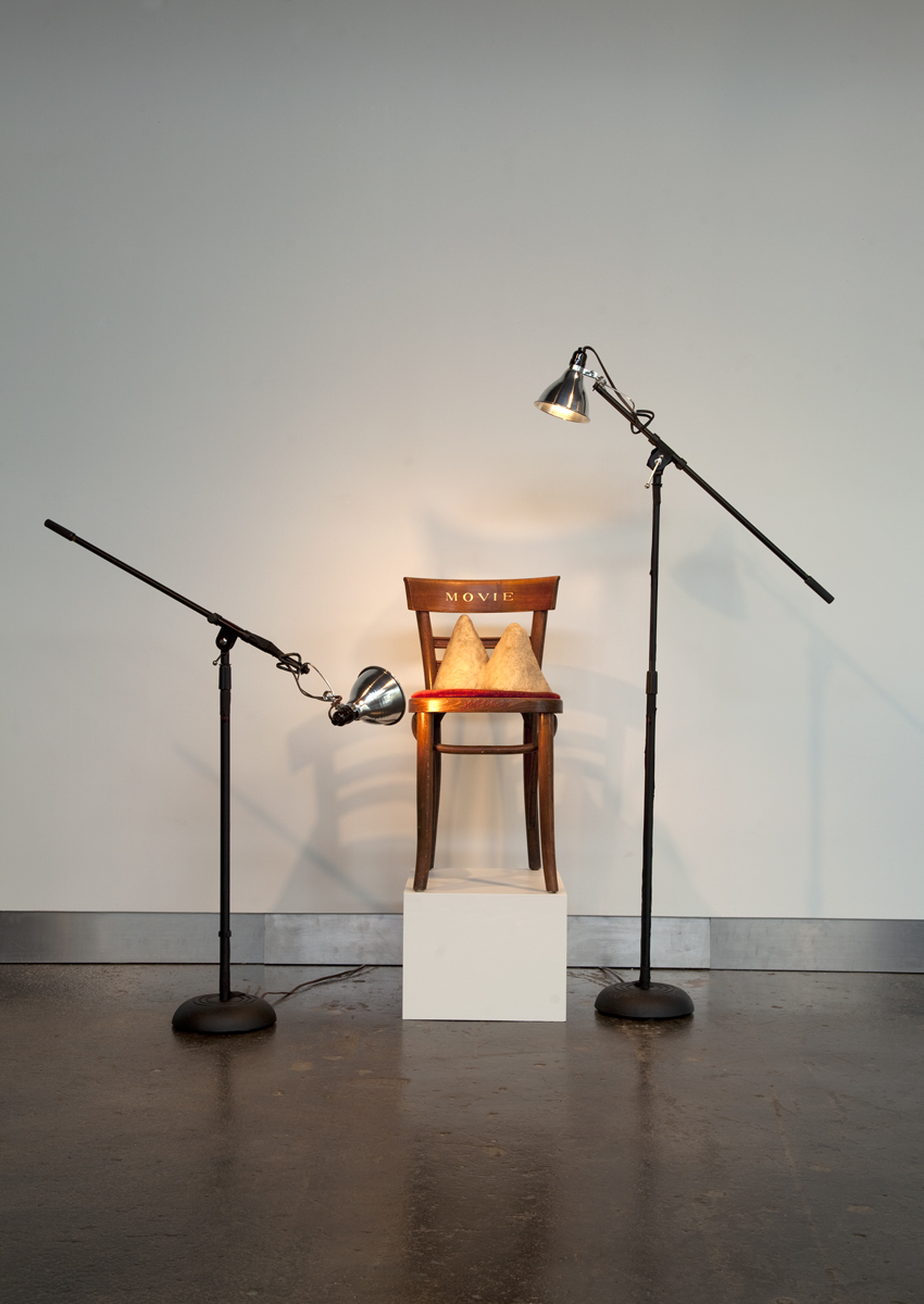 Jennifer Bolande, Movie Chair, 1984, wooden chair, velvet, bronze, enamel paint, light stands, lights, gaffer’s tape, 60 x 72 x 36 in.