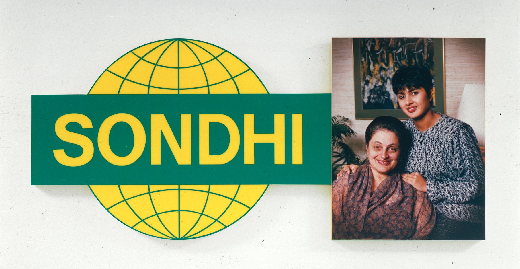 Ken Lum, Amrita and Mrs Sondhi, 1986, Dye coupler print and acrylic paint on opaque plexiglass, 40 x 89 x 2.5 in.