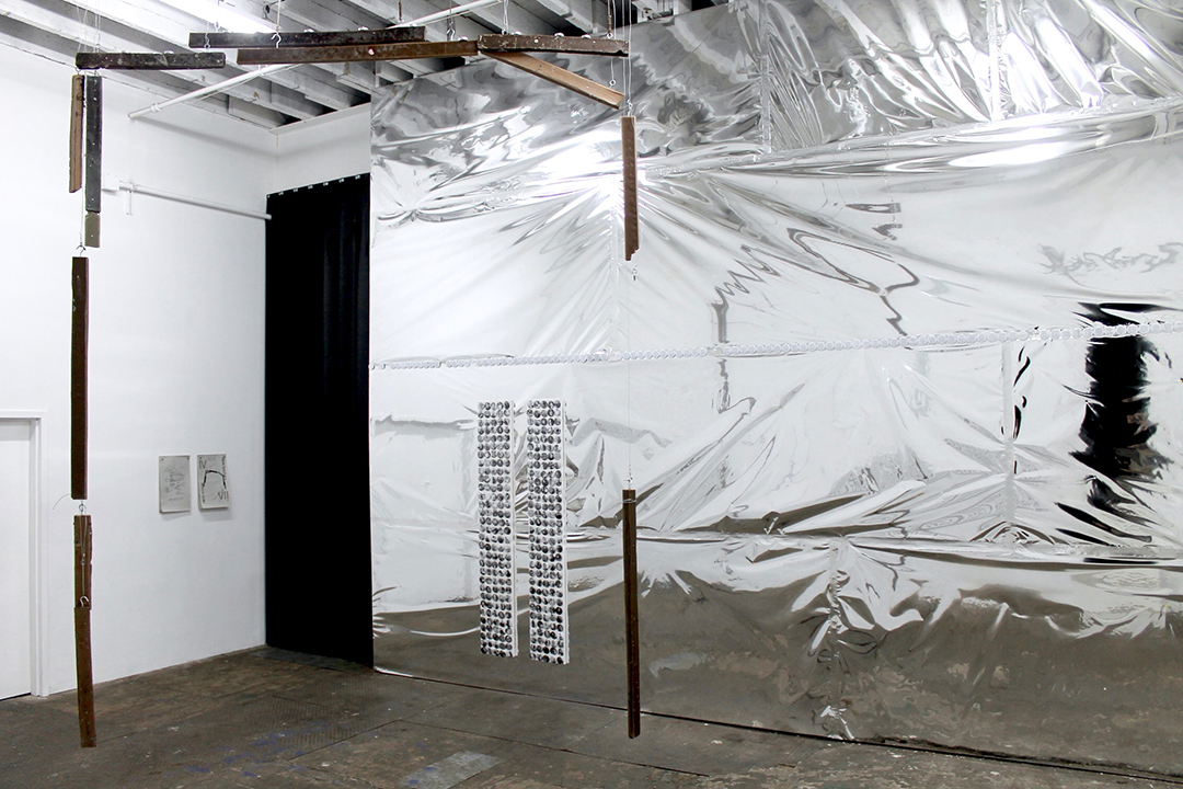Nikholis Planck, New Stage, 2017, wire, tea lights, collage, debris in cast wax.