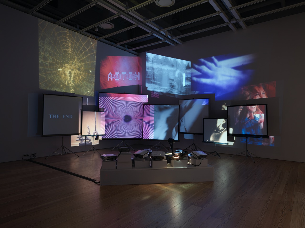 Stan VanDerBeek, Movie Mural, 1965-1968, (Multimedia Installation) slides, and overhead projection for 9 portable tripod projection screens, 16mm film and 70mm slides transferred to digital video, 35mm. Installation view, Dreamlands: Immersive Cinema and Art, 1905–2016, Whitney Museum of American Art, 2017. Image courtesy of the Whitney Museum of American Art and the Stan VanDerBeek Archive.