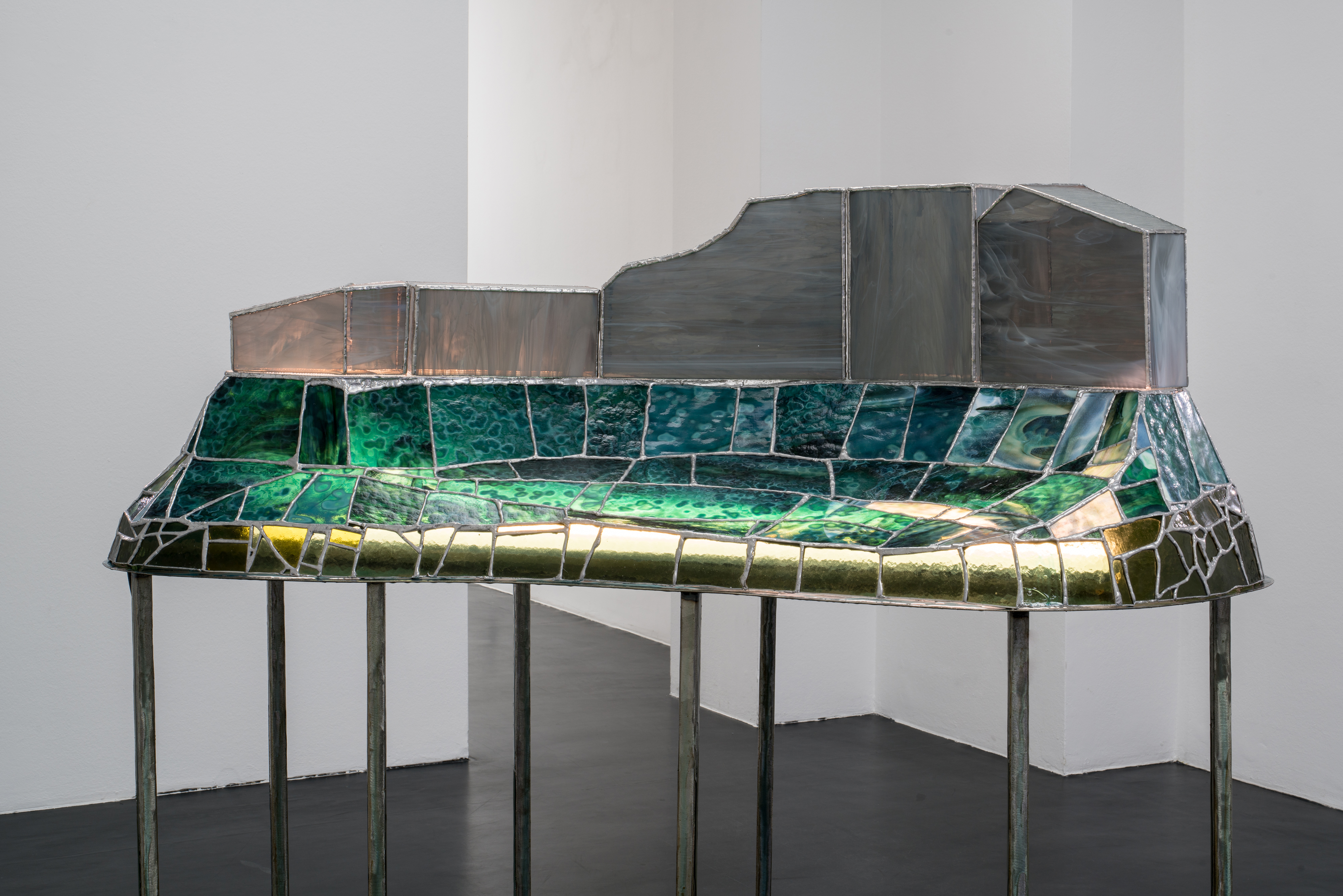 Tiril Hasselknippe, The Unfolding (table), 2021, stained glass, tin, steel, light fixture, resin 49.21 × 48.42 × 22 in.