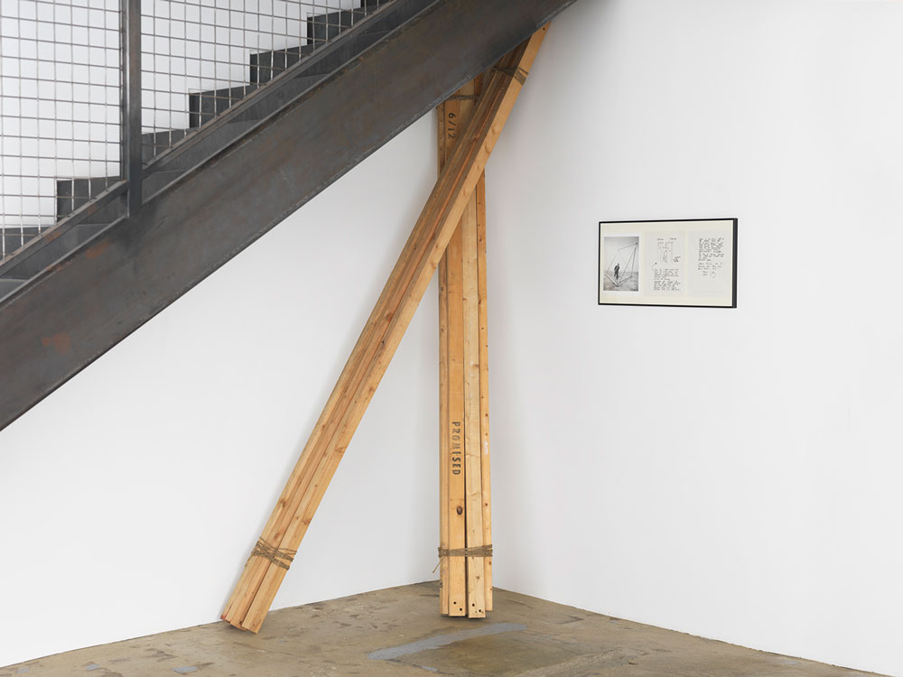 Georg Herold, Promised, 1990, 8 pieces of lumber, nuts, bolts, washers and tape, photo certificate and instructions, each piece 108 x 2 x 3 in; photo certificate framed: 13.25 x 26.25 x .75 in. Assembled dimensions vary. Edition of 12 + 4 APs.