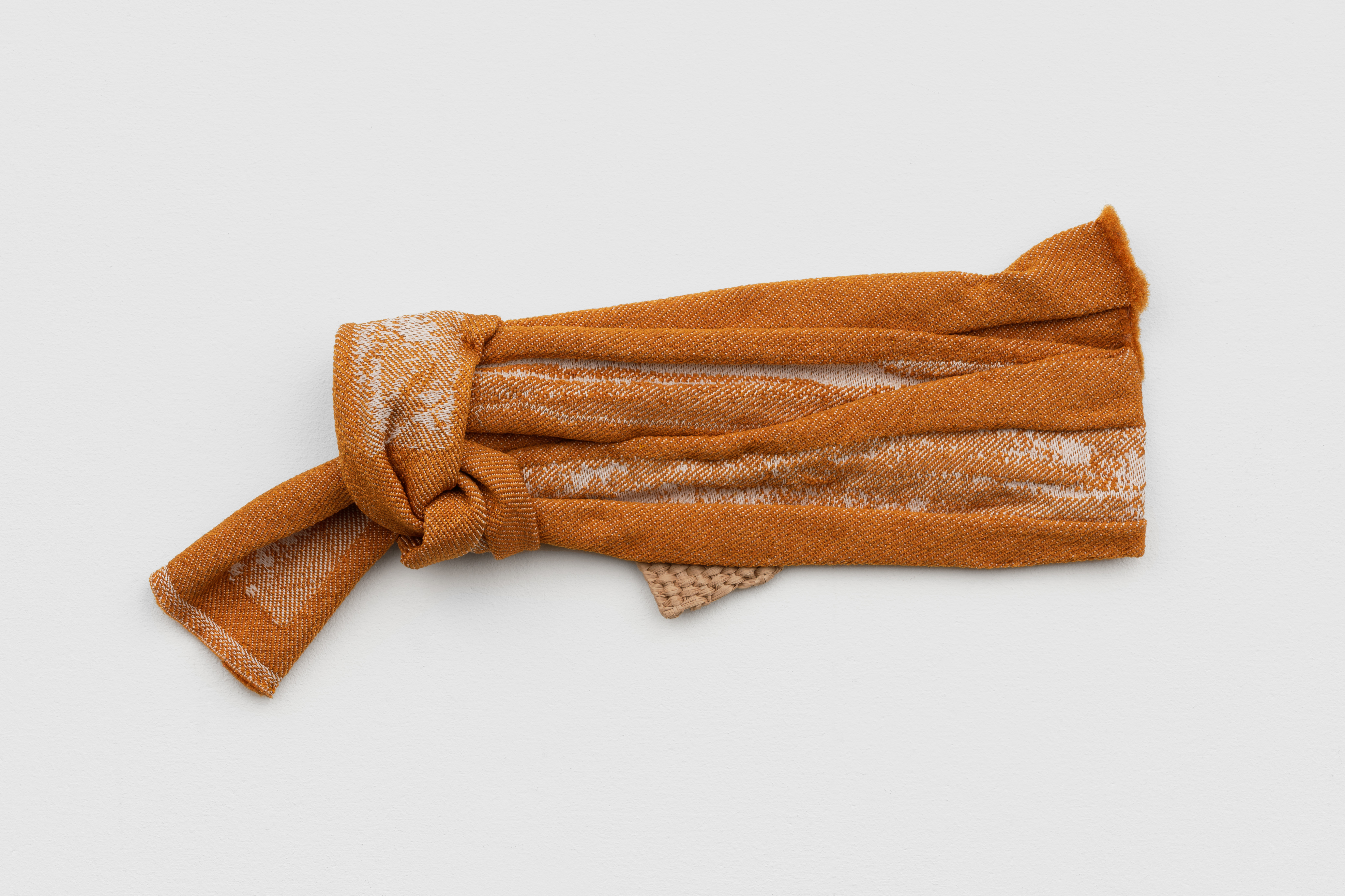 Hana Miletić, Materials, 2025, Hand-woven and Jacquard-woven textile (copper orange repurposed polyester, dark beige paper yarn, and white repurposed polyester), 8 1/4 x 17 5/16 x 3 15/16 in.