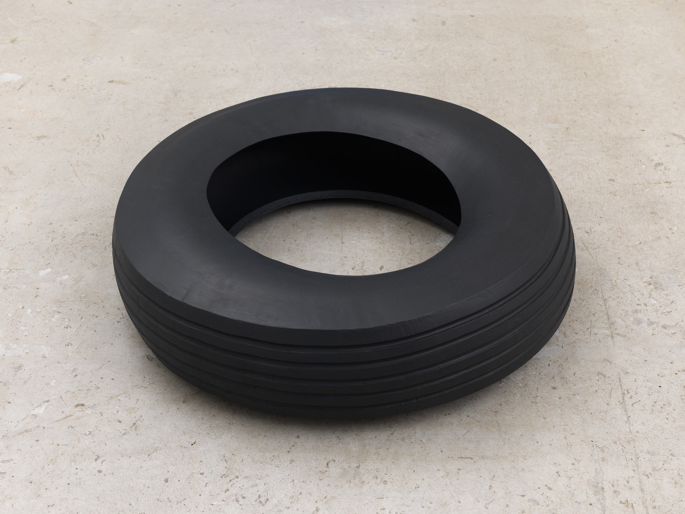 Nathaniel Robinson, Tire, 2018, fiberglass-reinforced gypsum cement, paint, 8h x 30w x 30d in.