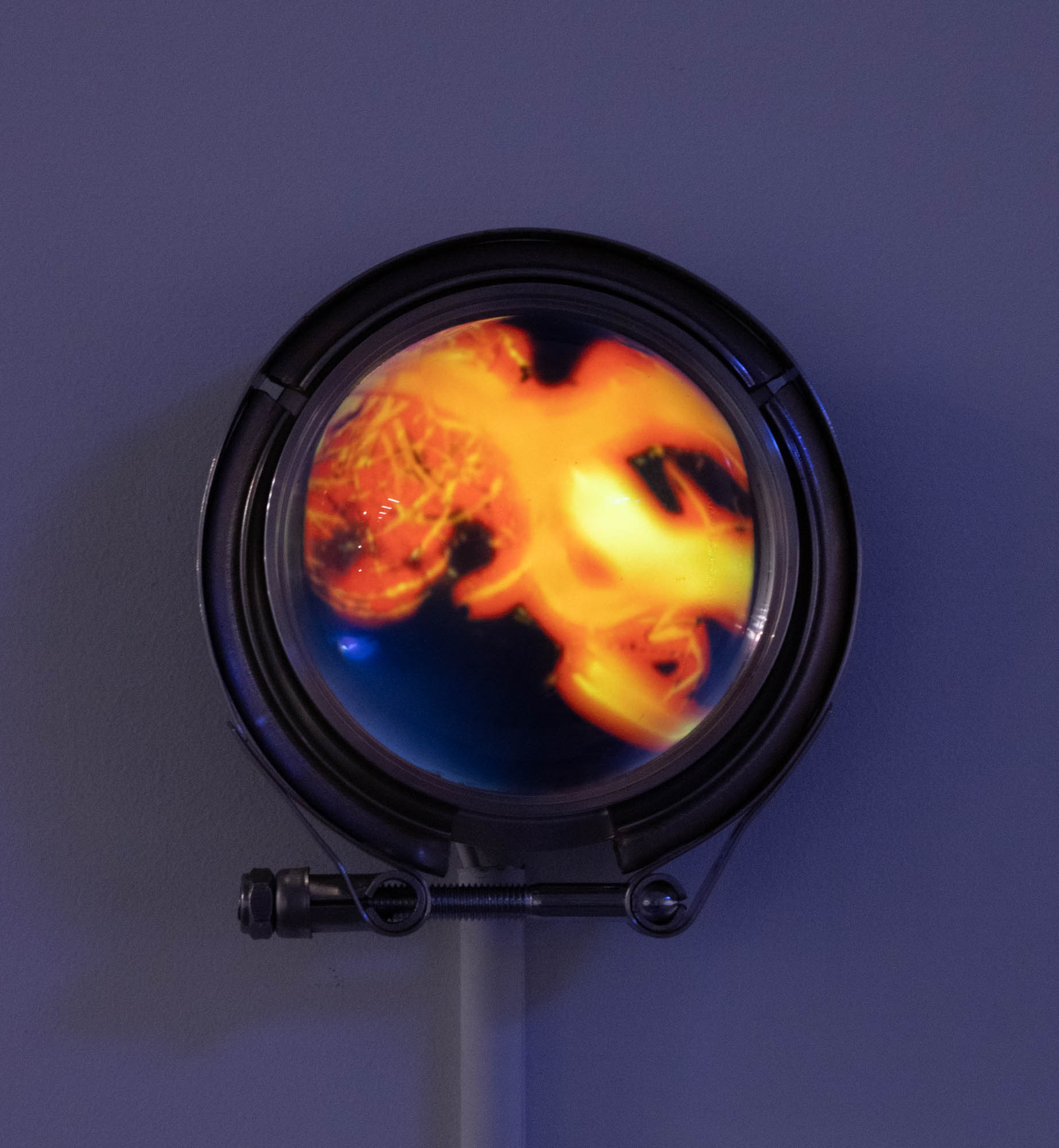 Rachel Rossin, Scry Glass I, 2023, Video on round LCD display, 5 3/4 x 5 1/2 x 3 1/2 in.