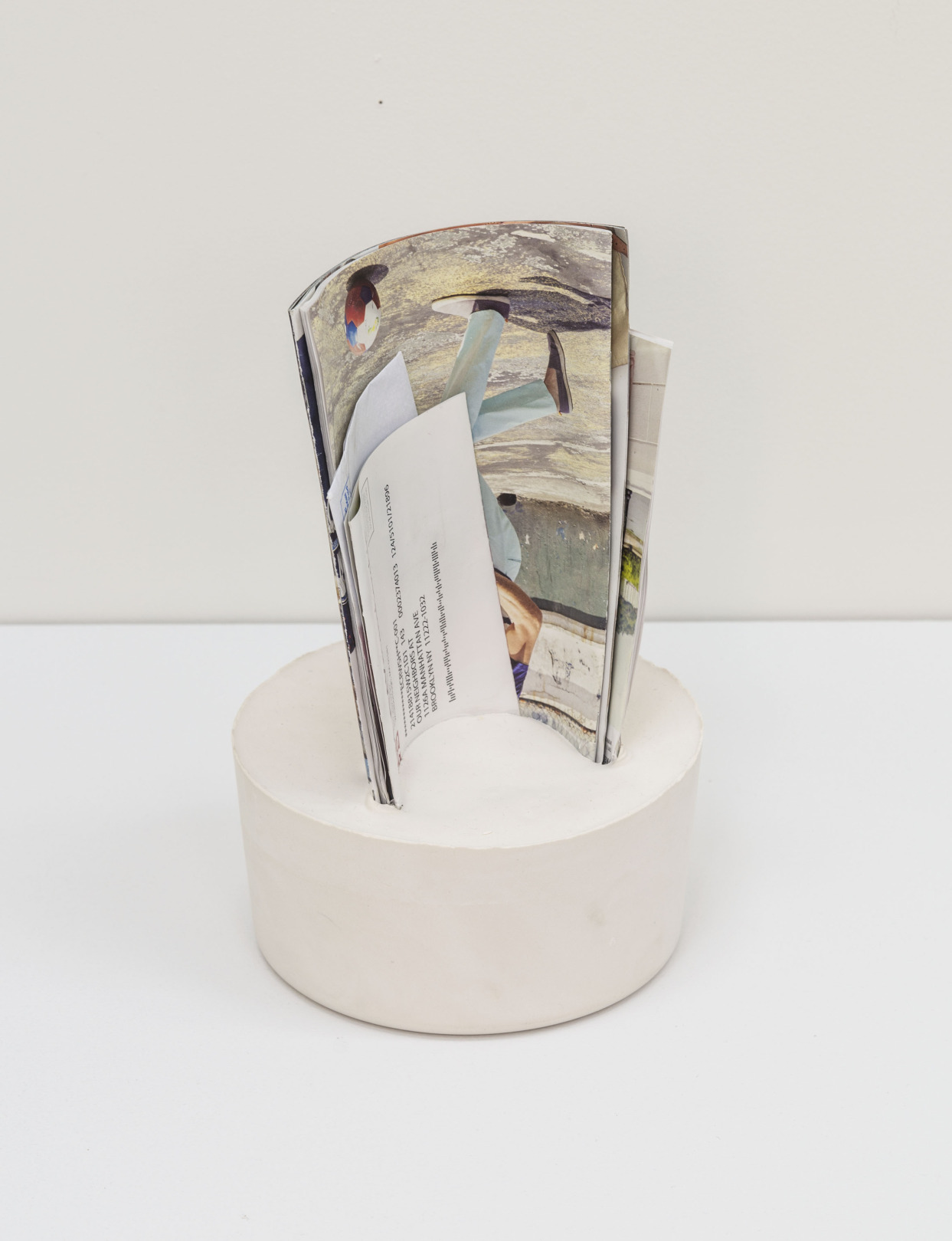 Dylan Bailey, Untitled, 2014, mail and plaster, 12.5h x 8w x 8d in.