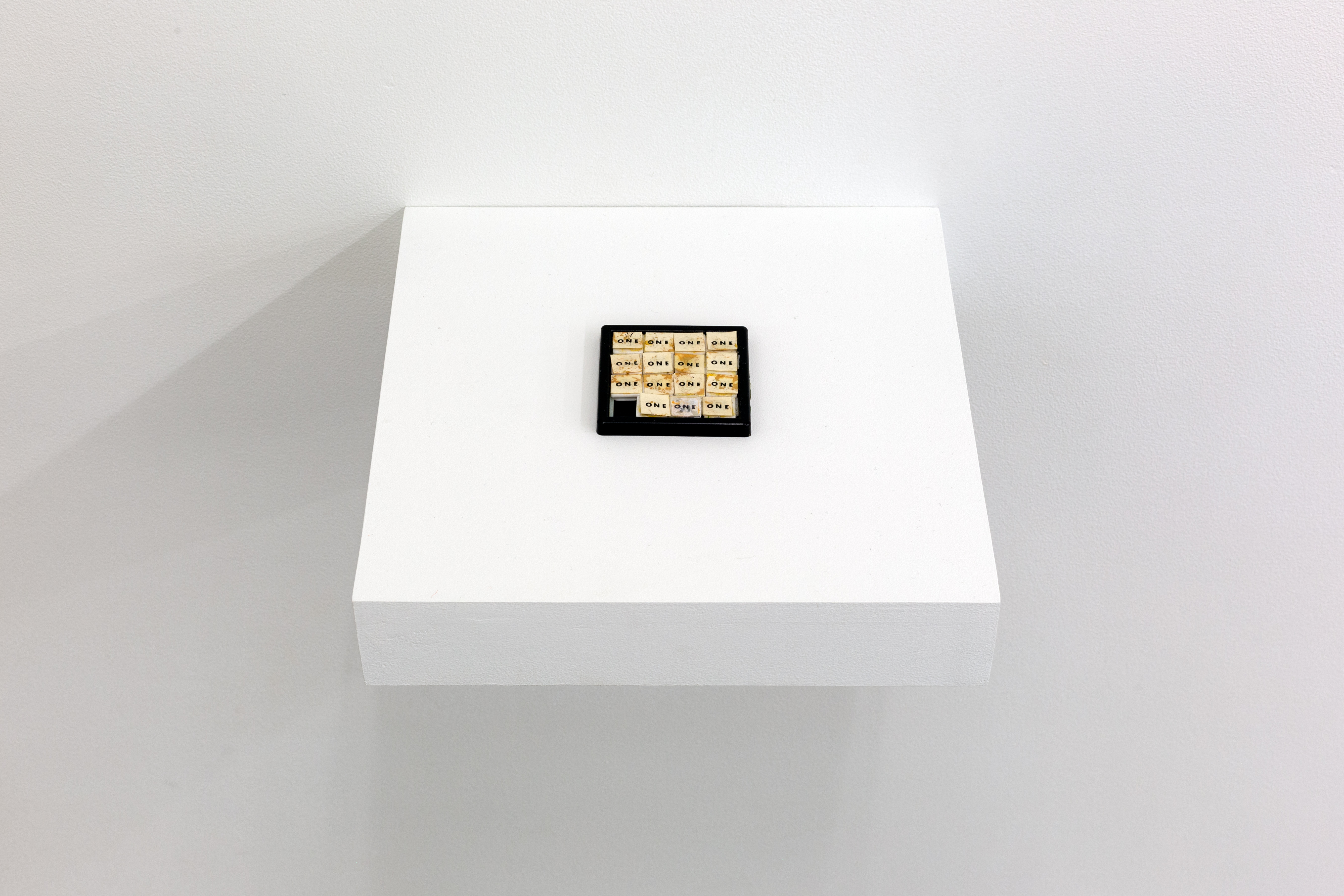 Dan Graham, One Puzzle, 1966, Plastic and paper, 2h x 2w in.