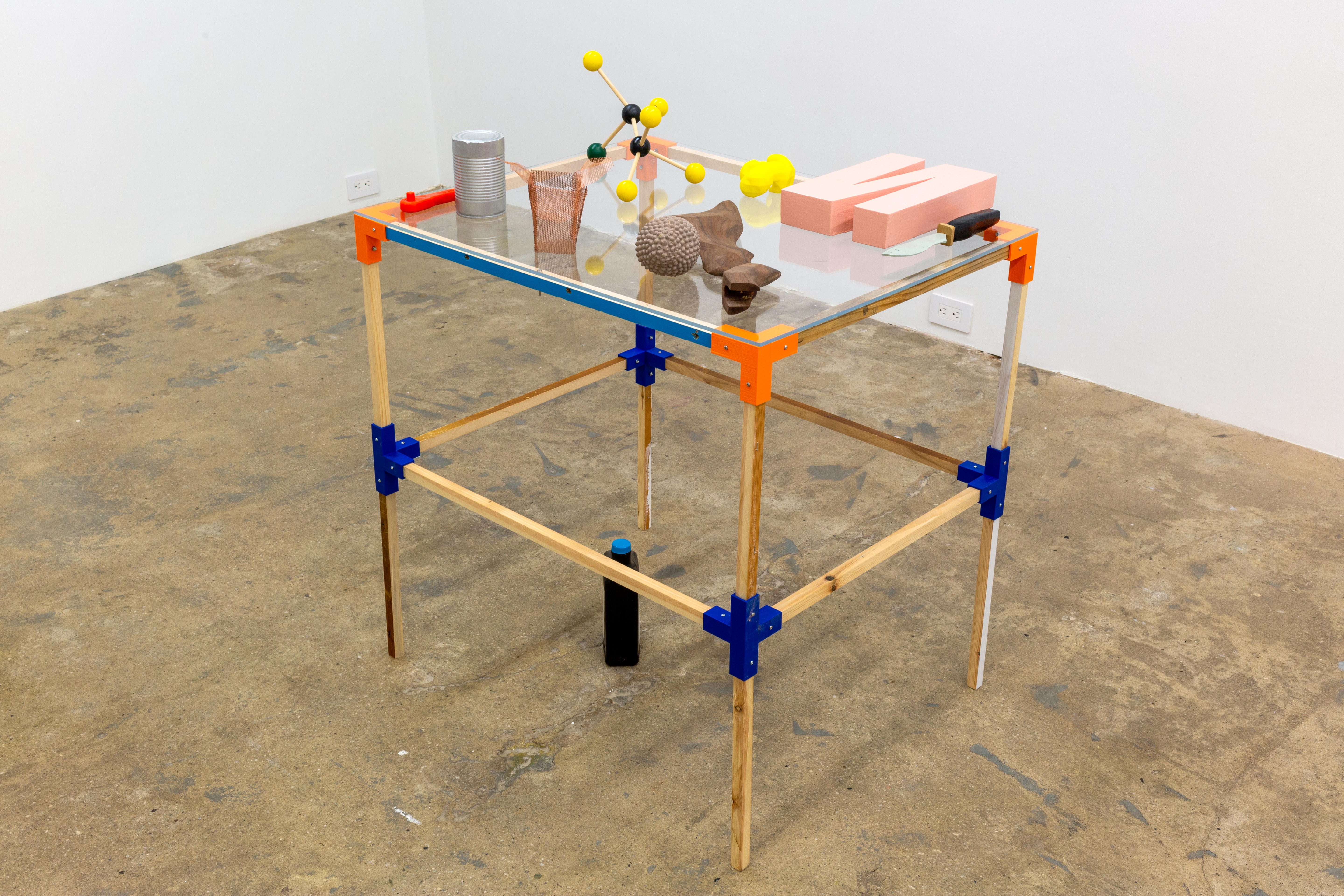 Maximilian Goldfarb, Transmitter: Small Object Array (Table II), 2021, Various handmade and fabricated objects on display table made of printed plastic connectors,, wood spans, hardware, plexi, 30h x 24w x 30d in.